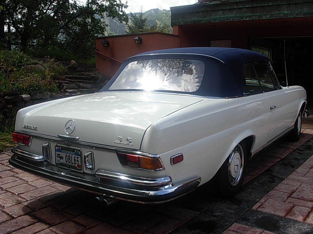 Mercedes 280 convertible in the driveway